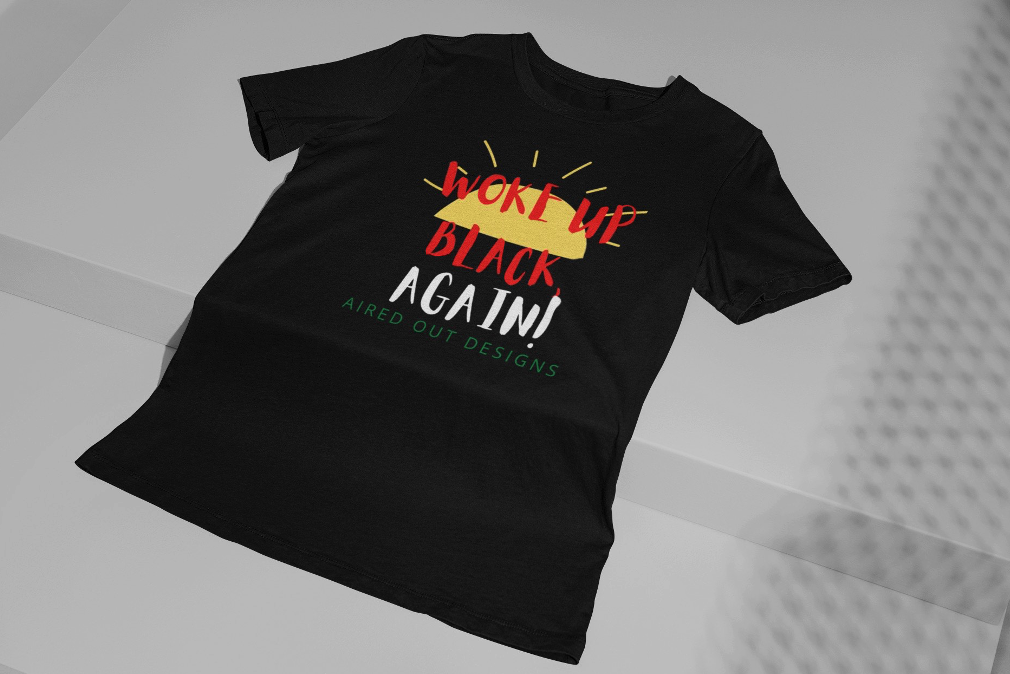 A black t-shirt with white text on it

Description automatically generated with medium confidence